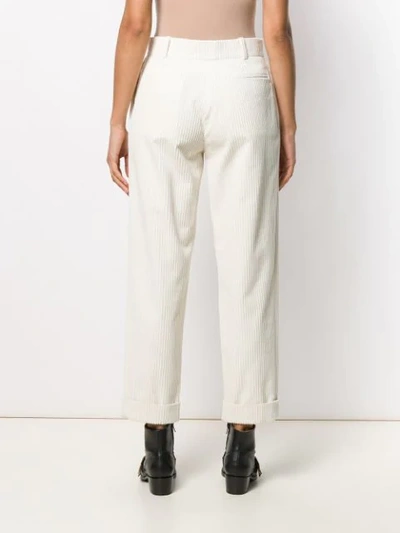 Shop Saint Laurent Tapered Corduroy Trousers In White