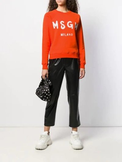 Shop Msgm Logo Print Crew Neck Sweater In Orange