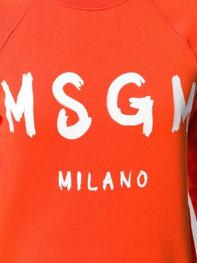 Shop Msgm Logo Print Crew Neck Sweater In Orange
