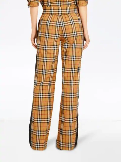 Shop Burberry Karierte Hose Mit Kordelzug In Yellow