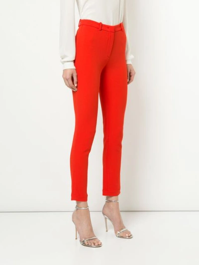 Shop Roberto Cavalli Cropped Skinny Trousers - Red