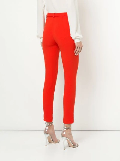 Shop Roberto Cavalli Cropped Skinny Trousers - Red