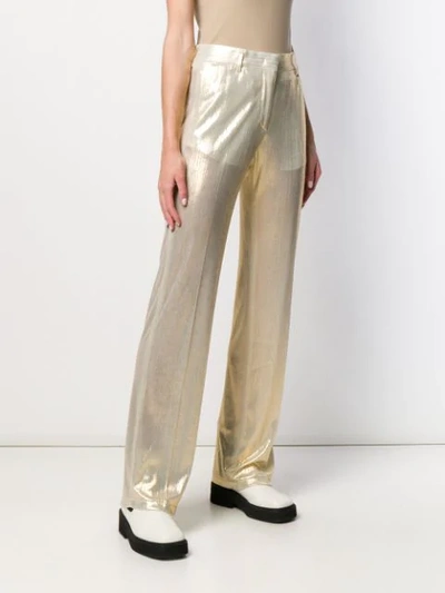 Shop Msgm Metallic Straight Trousers In Gold