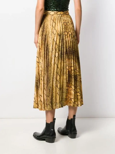 Shop Andamane Snakeskin Print Pleated Skirt In Yellow