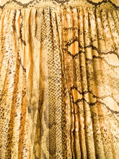 Shop Andamane Snakeskin Print Pleated Skirt In Yellow