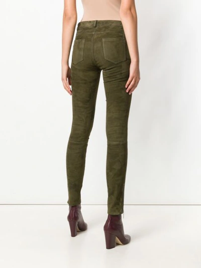 Shop Arma Skinny Trousers In Green