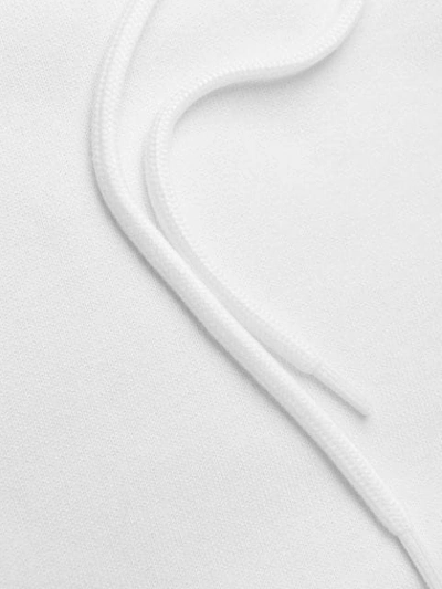 Shop Msgm Oversized Logo Drawstring Hoodie In White