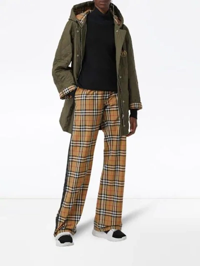 Shop Burberry Flared Checked Trousers - Multicolour