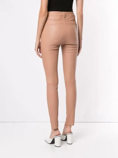 Shop Drome Skinny Leather Trousers In Neutrals