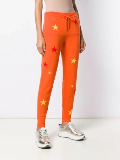 Shop Chinti & Parker Star Patterned Track Trousers In Orange