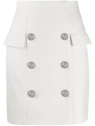 Shop Balmain Embossed Buttons Mini Skirt In White