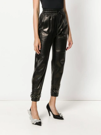 Shop Givenchy Slouched Biker Trousers In Black