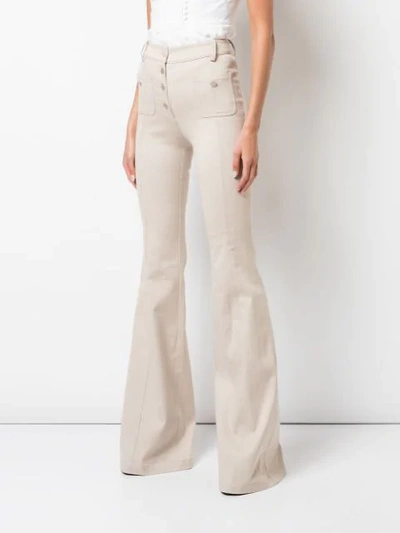 Shop Alexis Helene Flared Jeans In Neutrals