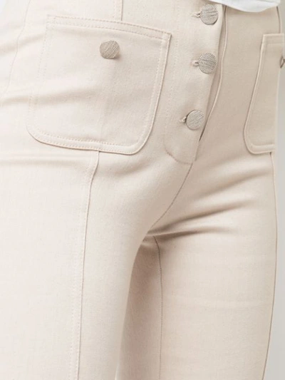 Shop Alexis Helene Flared Jeans In Neutrals