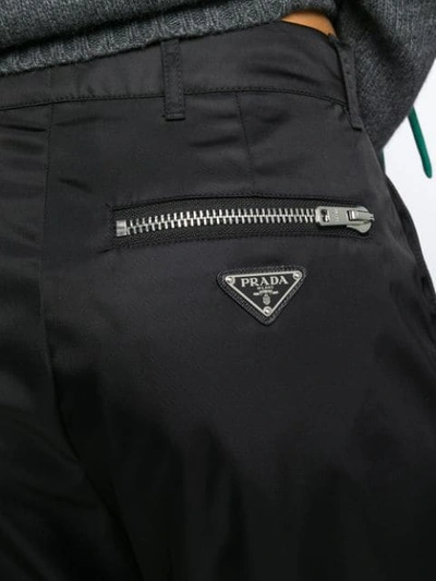 Shop Prada Zipped Cargo Trousers In Black
