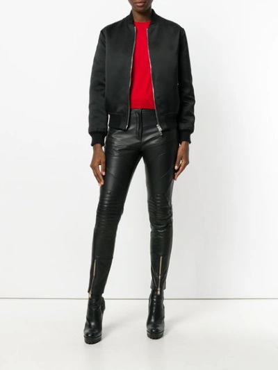 Shop Versace Slim Biker Trousers In Black