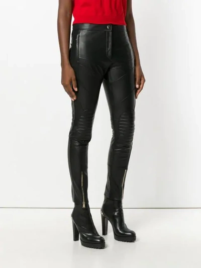Shop Versace Slim Biker Trousers In Black