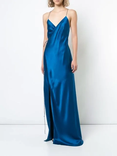 Shop Michelle Mason Strappy Wrap Gown In Blue