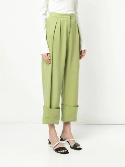 Shop Christopher Esber Pleated Front Wide Leg Trousers In Green