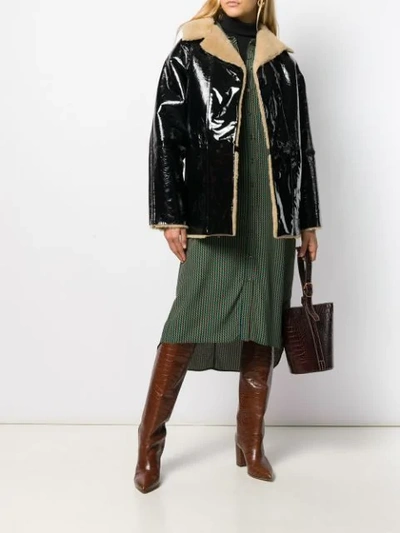 Kassl Reversible Oversized Coat In Black