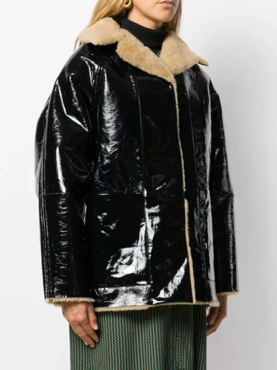 Kassl Reversible Oversized Coat In Black