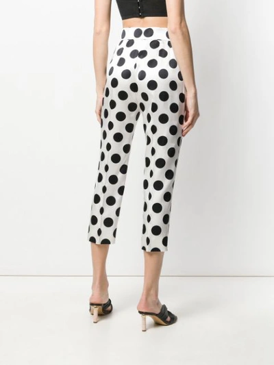 Shop Dolce & Gabbana Dotted Cropped Trousers In White