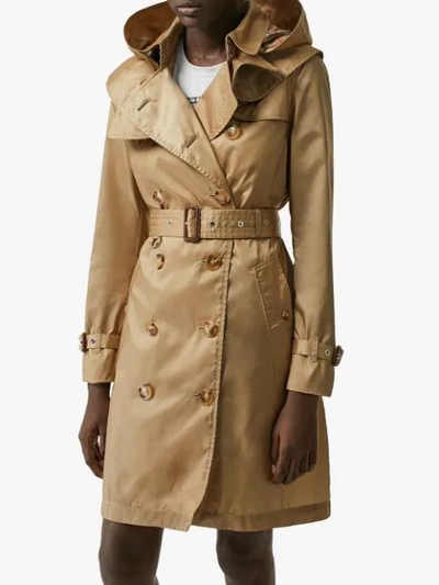 Shop Burberry Detachable Hood Trench Coat In Brown