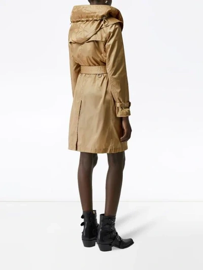 Shop Burberry Detachable Hood Trench Coat In Brown