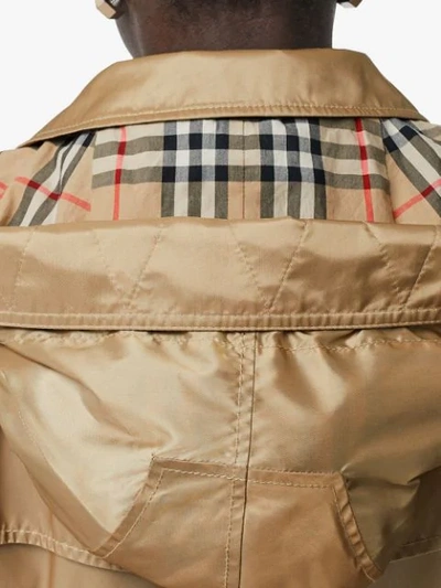 Shop Burberry Detachable Hood Trench Coat In Brown