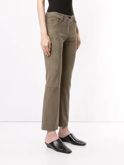 Shop The Row Suede Cropped Trousers In Green