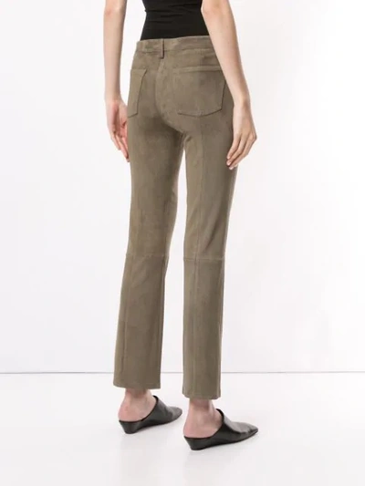 Shop The Row Suede Cropped Trousers In Green