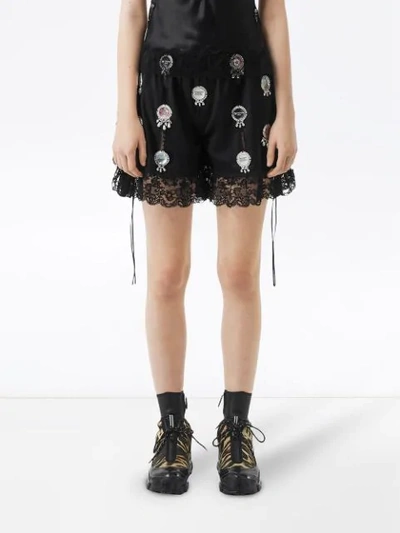 Shop Burberry Bottle Cap Detail Satin And Lace Shorts In Black