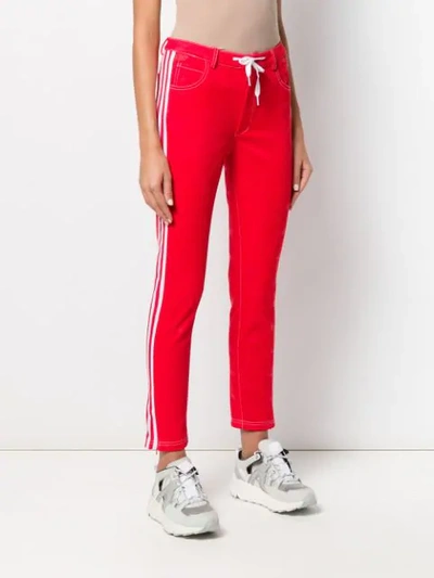 Shop Fiorucci X Adidas All Over Angels Trackpants In Red