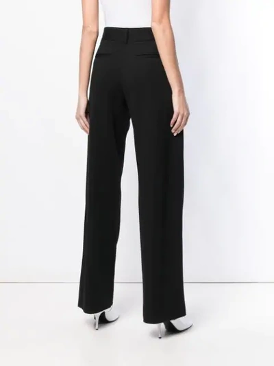 Shop Loewe Piping Jersey Trousers In Black
