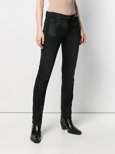 Shop Versace Jeans Distressed Slim-fit Jeans In Black