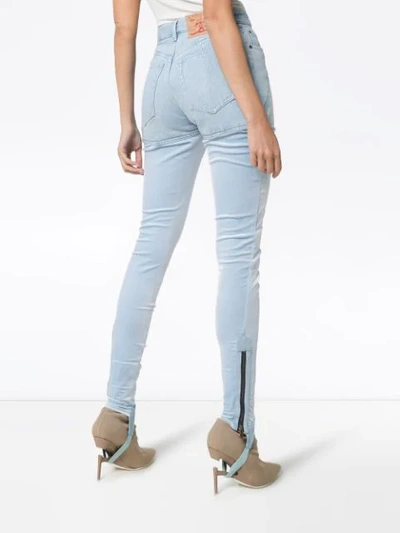 Shop Y/project High-rise Stirrup Jeans In Blue