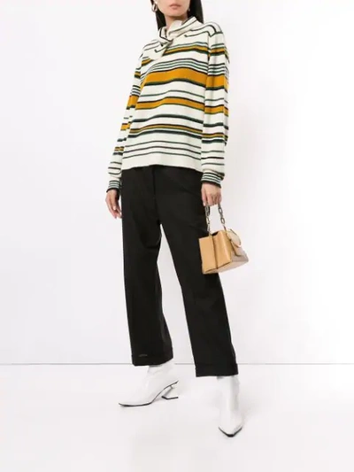 Shop Jw Anderson Striped High Neck Sweater In Brown