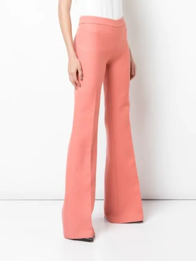 Shop Giambattista Valli Flared Mid-rise Trousers In Red