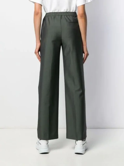 Shop Acne Studios Elasticated Straight-leg Trousers In Green