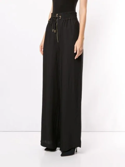 Shop Alice Mccall Gathered Palazzo Trousers In Black