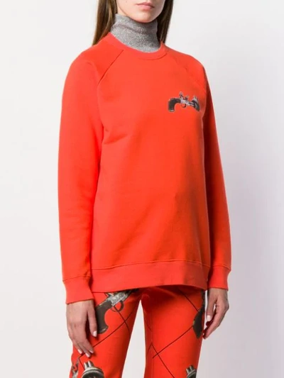 Shop Kirin Peggy Gou Gun Print Sweatshirt In Orange