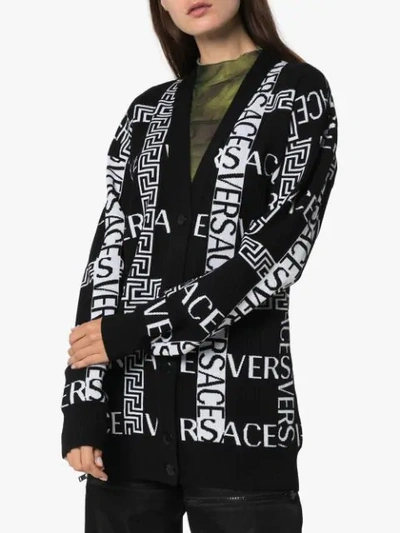 Shop Versace Greek Key Logo-intarsia Cardigan In Black