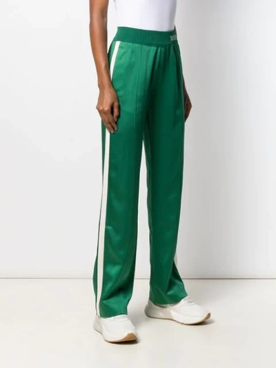 Shop Moncler Logo Waistband Track Trousers In Green