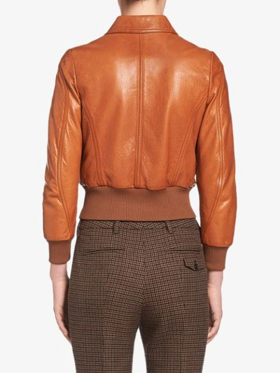 Shop Prada Leather Bomber Jacket In Brown