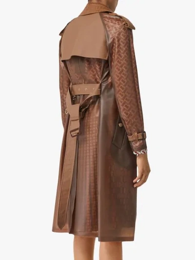 Shop Burberry Double-breasted Belted Trench Coat In Brown