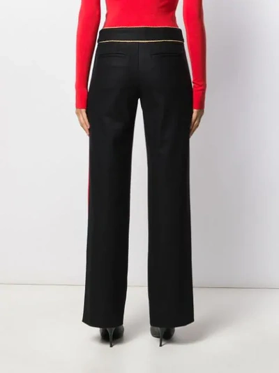 Shop Paco Rabanne Piped Trousers In Black