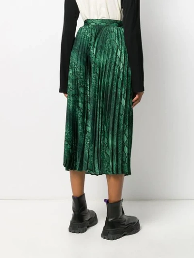 Shop Andamane Snakeskin Print Pleated Skirt In Green