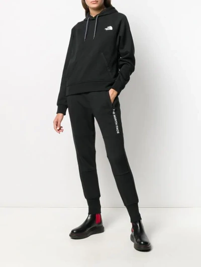 Shop The North Face Contrast Logo Hoodie In Black