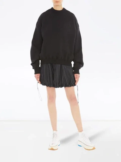 Shop Jw Anderson Pinstriped Balloon Shorts In Blue