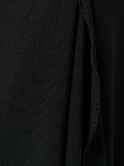 Shop Versace Ruffled Hem Flared Trousers In Black